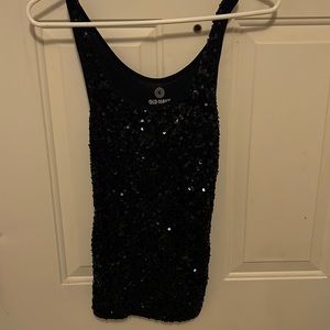 Beaded sleeveless top. Fitted . Black